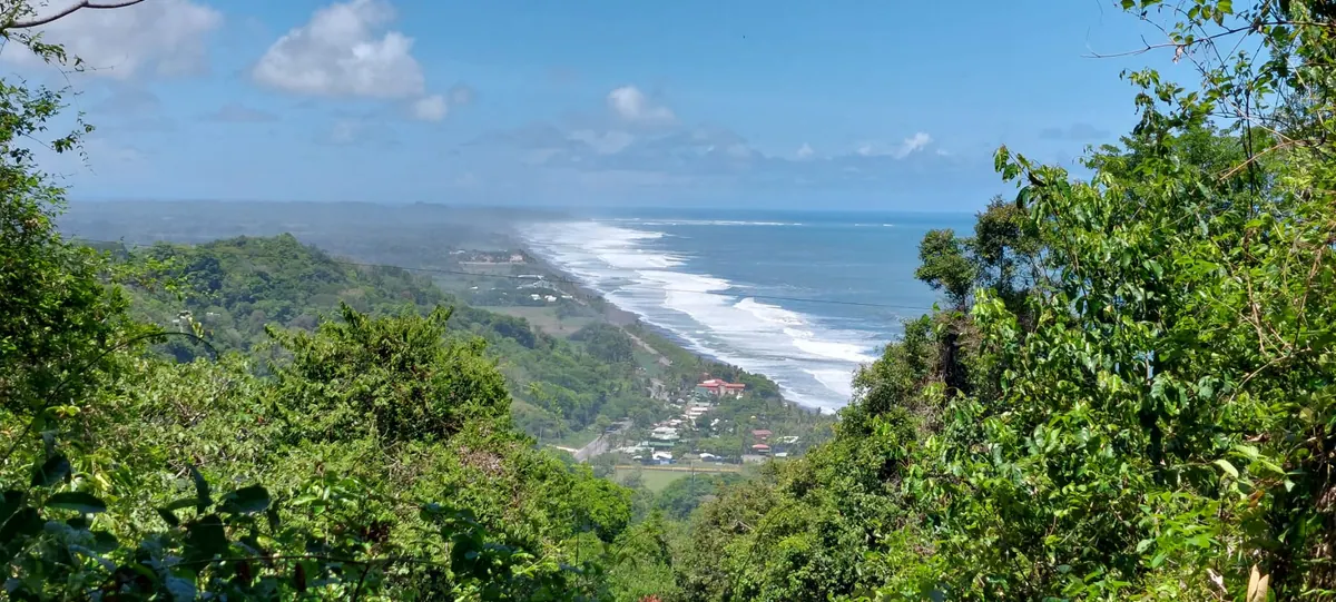 Panoramic view of the Costa Rican coastline from the jungle hills above Playa Hermosa