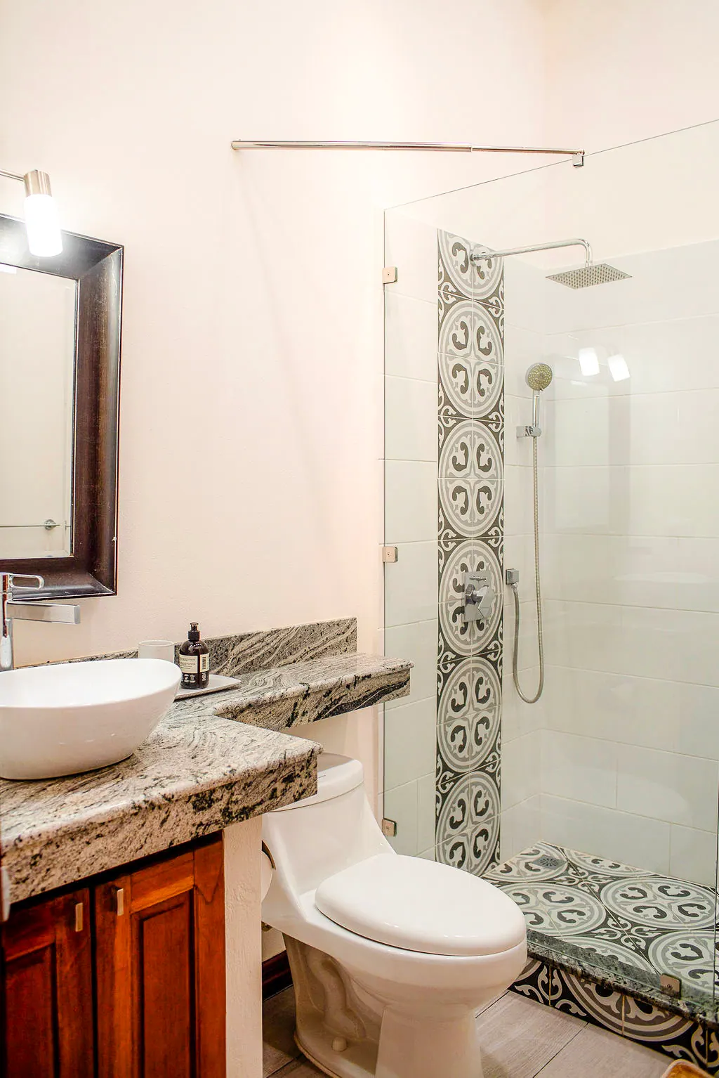 Second bathroom shower with decorative tile work