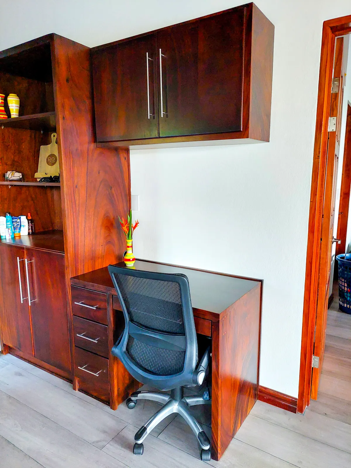 Dedicated work area with desk, monitor, and ergonomic setup
